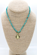 Load image into Gallery viewer, Reversible Gold Buddha Charm on Turquoise Necklace
