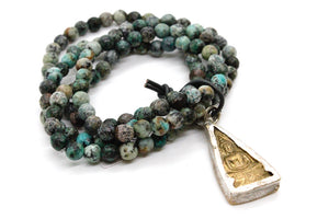 African Turquoise Bracelet with Two Tone Reversible Buddha Charm