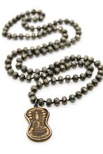 Load image into Gallery viewer, Peanut Shaped Brass Amulet on Pyrite Knotted Necklace
