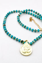 Load image into Gallery viewer, Reversible Gold Buddha Charm on Turquoise Necklace
